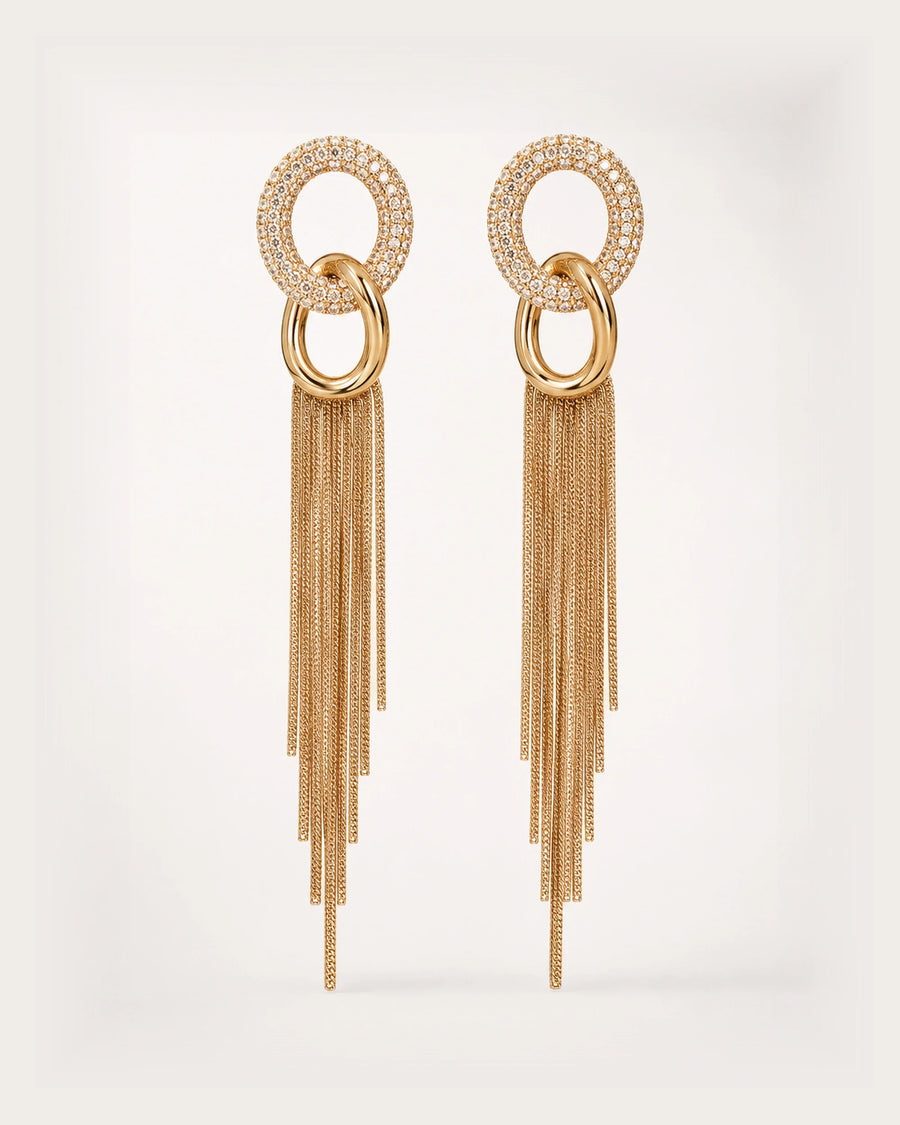 Hohto Pavé Tassel Earrings on a soft warm grey background