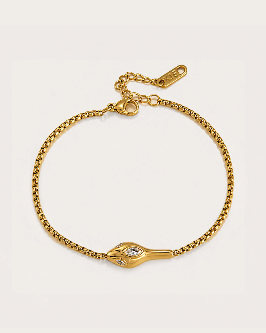 Seren Coil Zircon Bracelet on a soft warm grey background