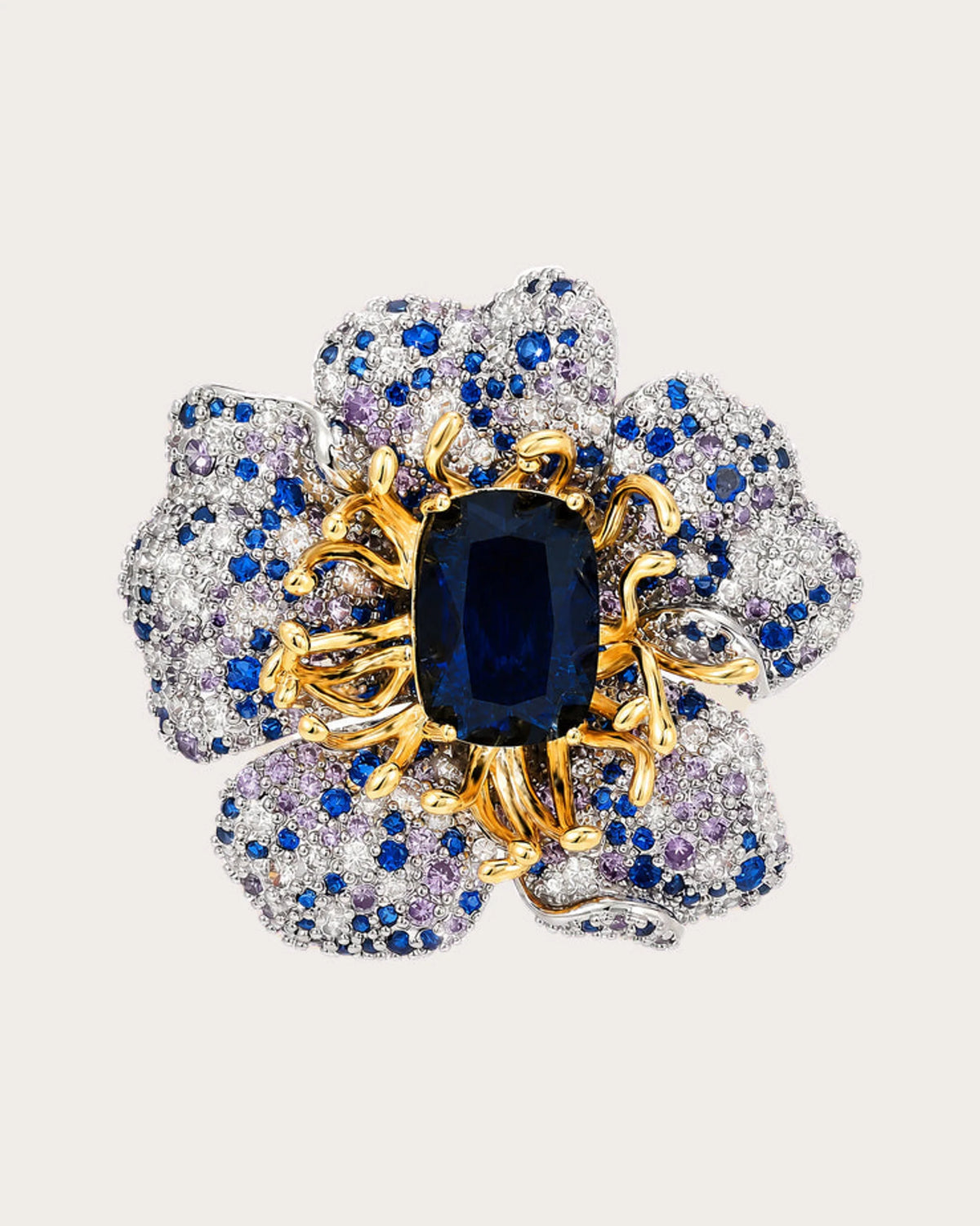 Sini Midnight Bloom Brooch on a soft warm grey background
