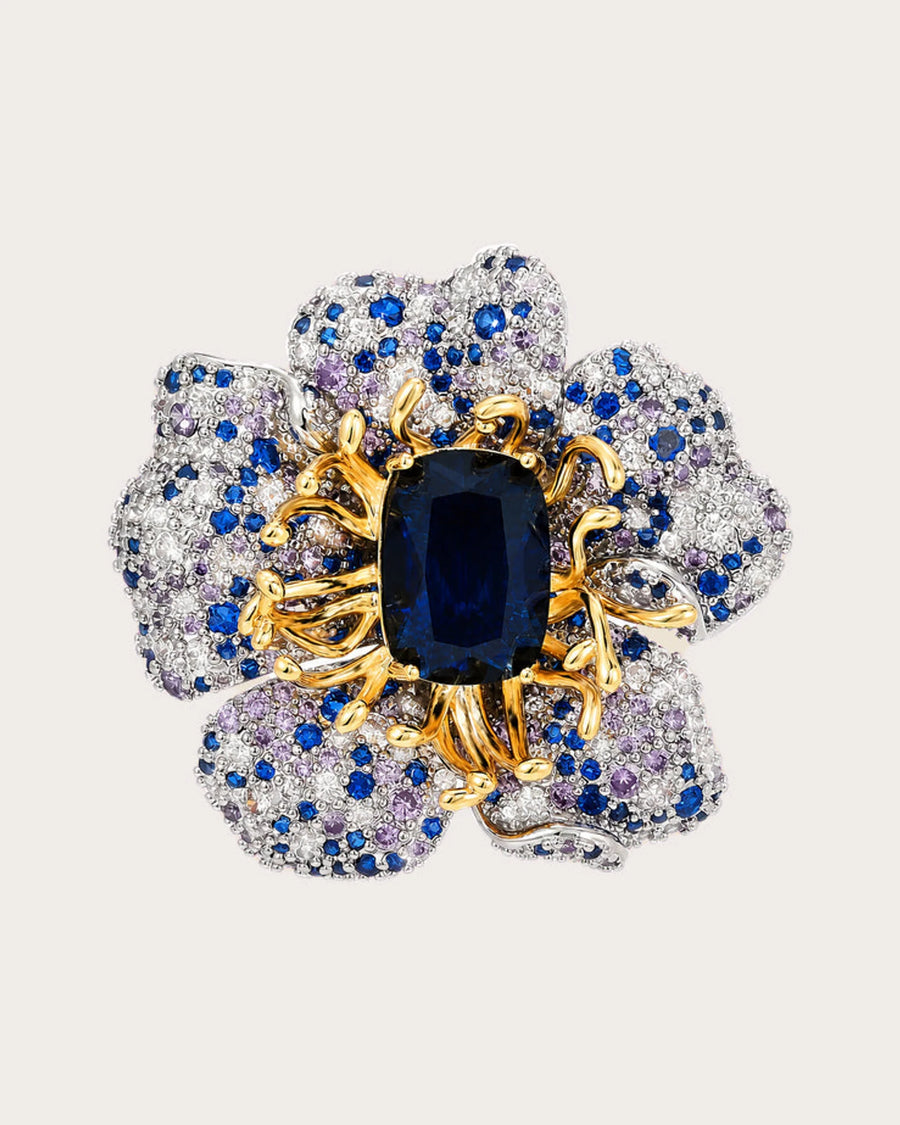 Sini Midnight Bloom Brooch on a soft warm grey background