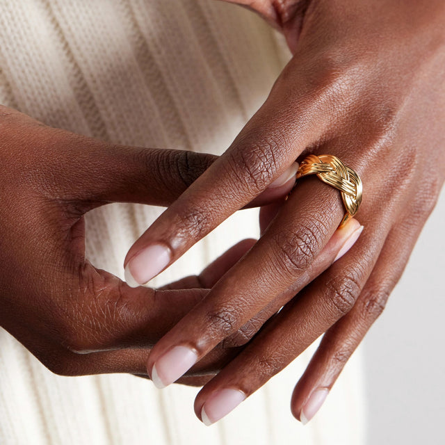 Jewelry worn in warm light