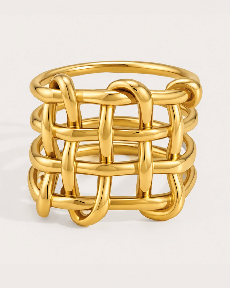 Trellis Light Wide Ring on a soft warm grey background