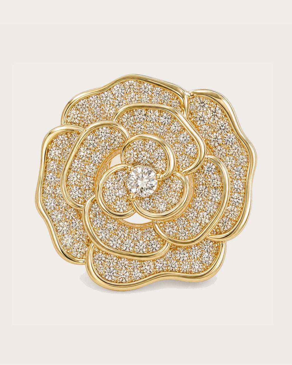 Valo Crystal Camellia Brooch on a soft warm grey background