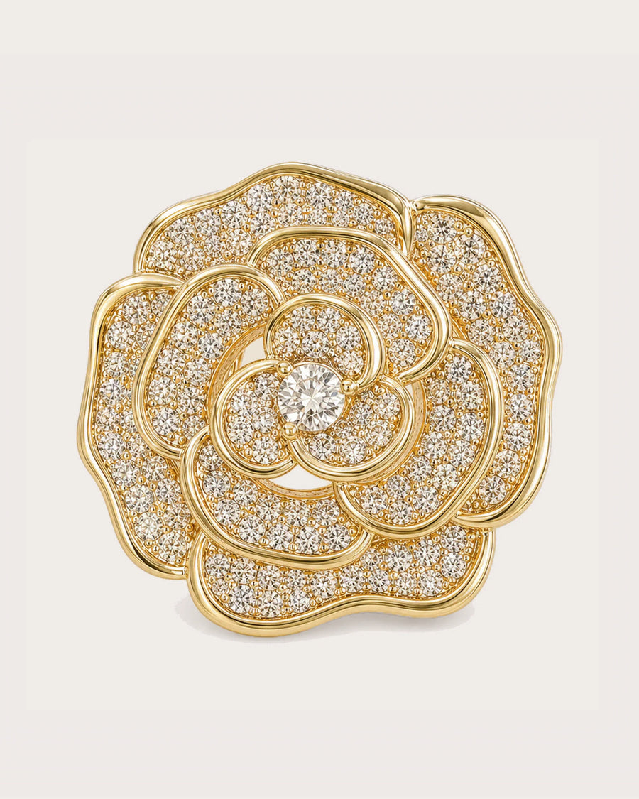 Valo Crystal Camellia Brooch on a soft warm grey background