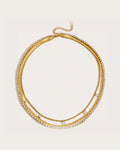 Vesper Line Layered Necklace on a soft warm grey background