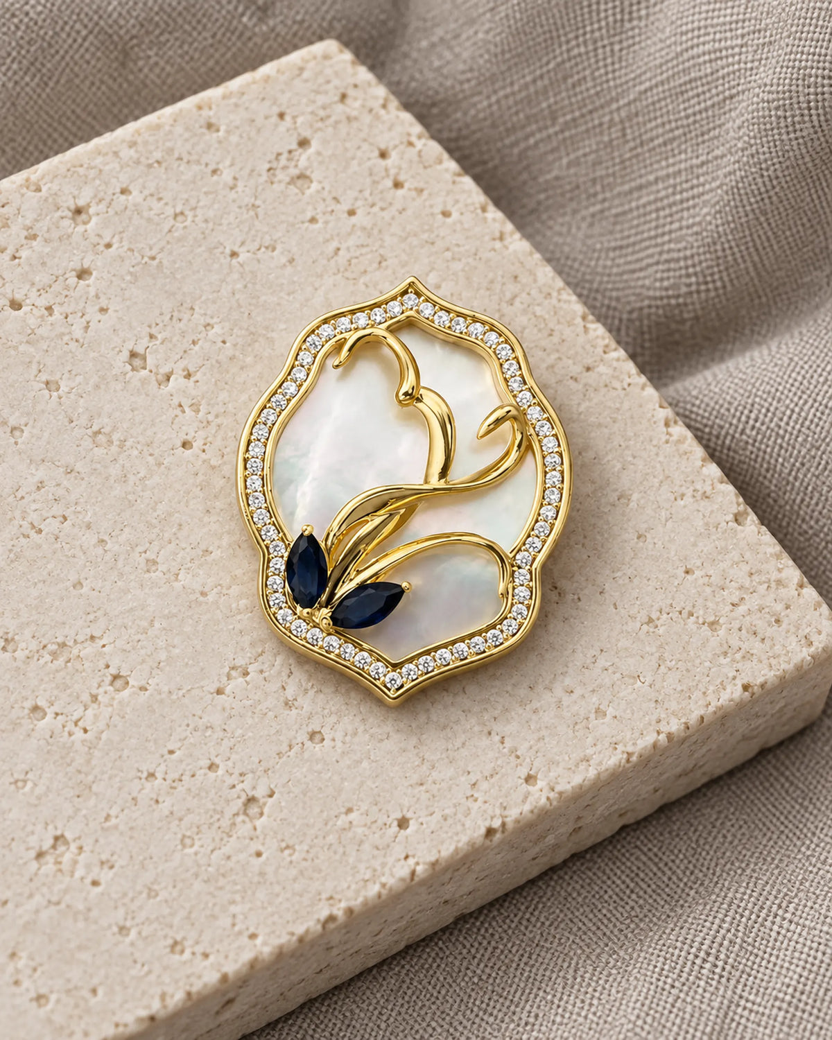 Tuuli Framed Calla Magnetic Brooch, Gold & White, product still life
