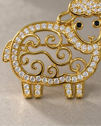 Close-up of open gold curls and clear crystal outline