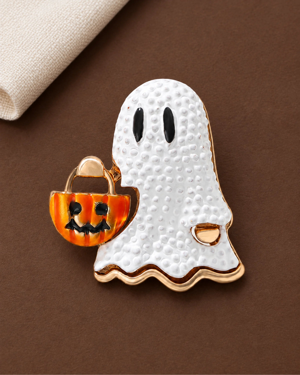 Usva Ghost Pumpkin Bucket Brooch in a product still life