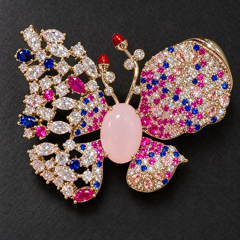 The pale-pink oval sits between an open multicolor lattice and densely set clear, pink and blue accents.