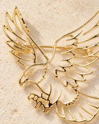Detail of Vinge gold-plated feather outlines and open wing spaces