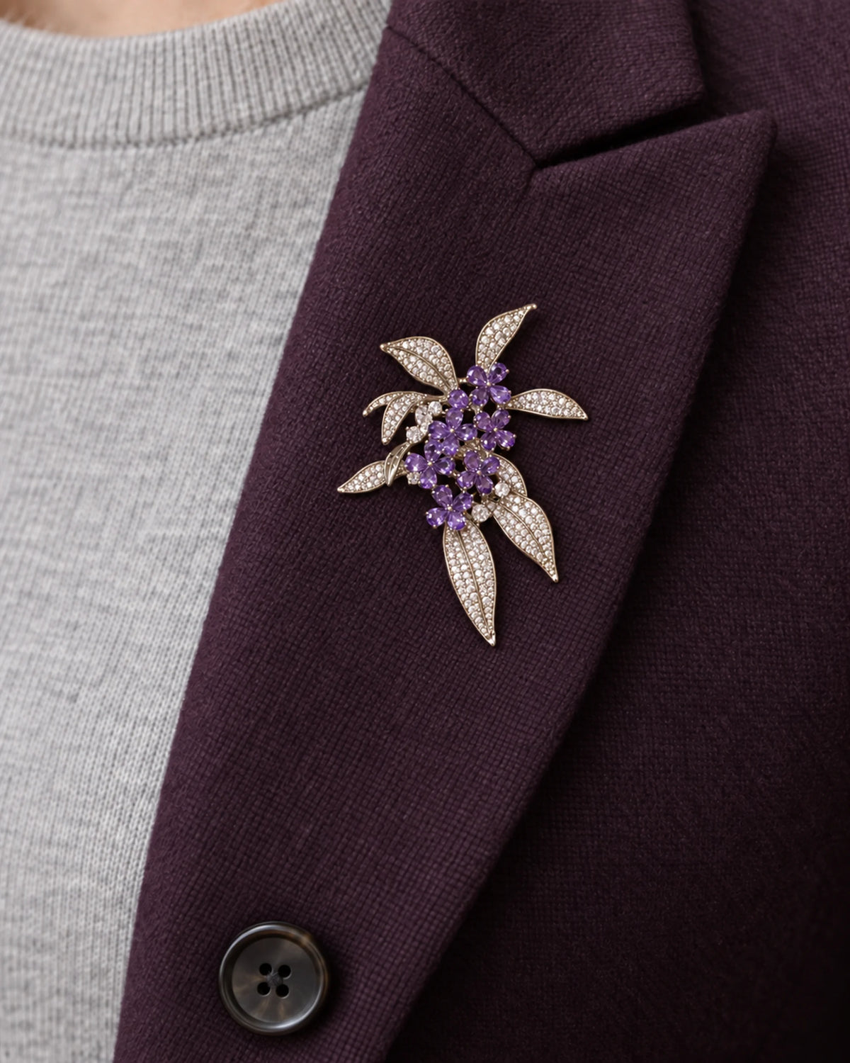 Violetta Purple Flower Cluster Brooch — close wearing view on a tailored lapel