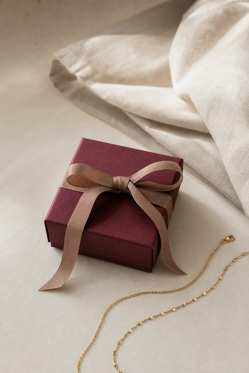 Premium gift packaging with gold jewelry detail