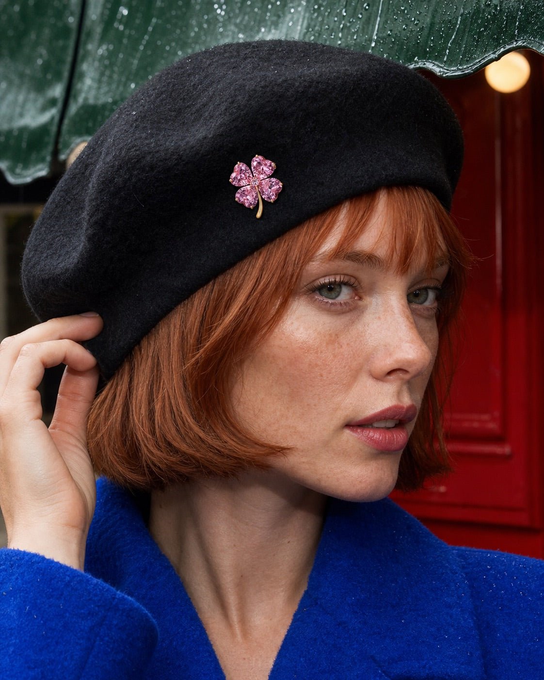 Rose Pink clover brooch worn on a wool hat
